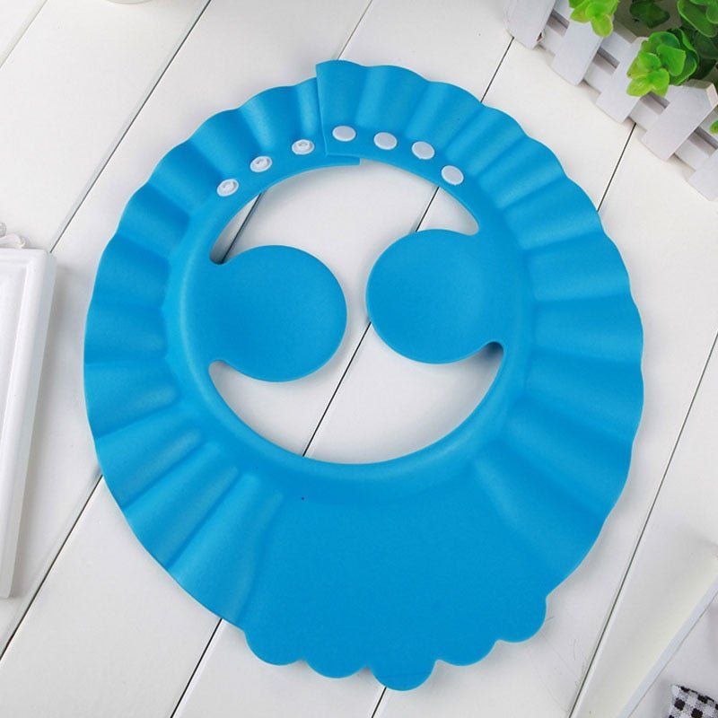 Visière chapeau pour douche bébé I ShampooCap™ - Petitmondemagik.com